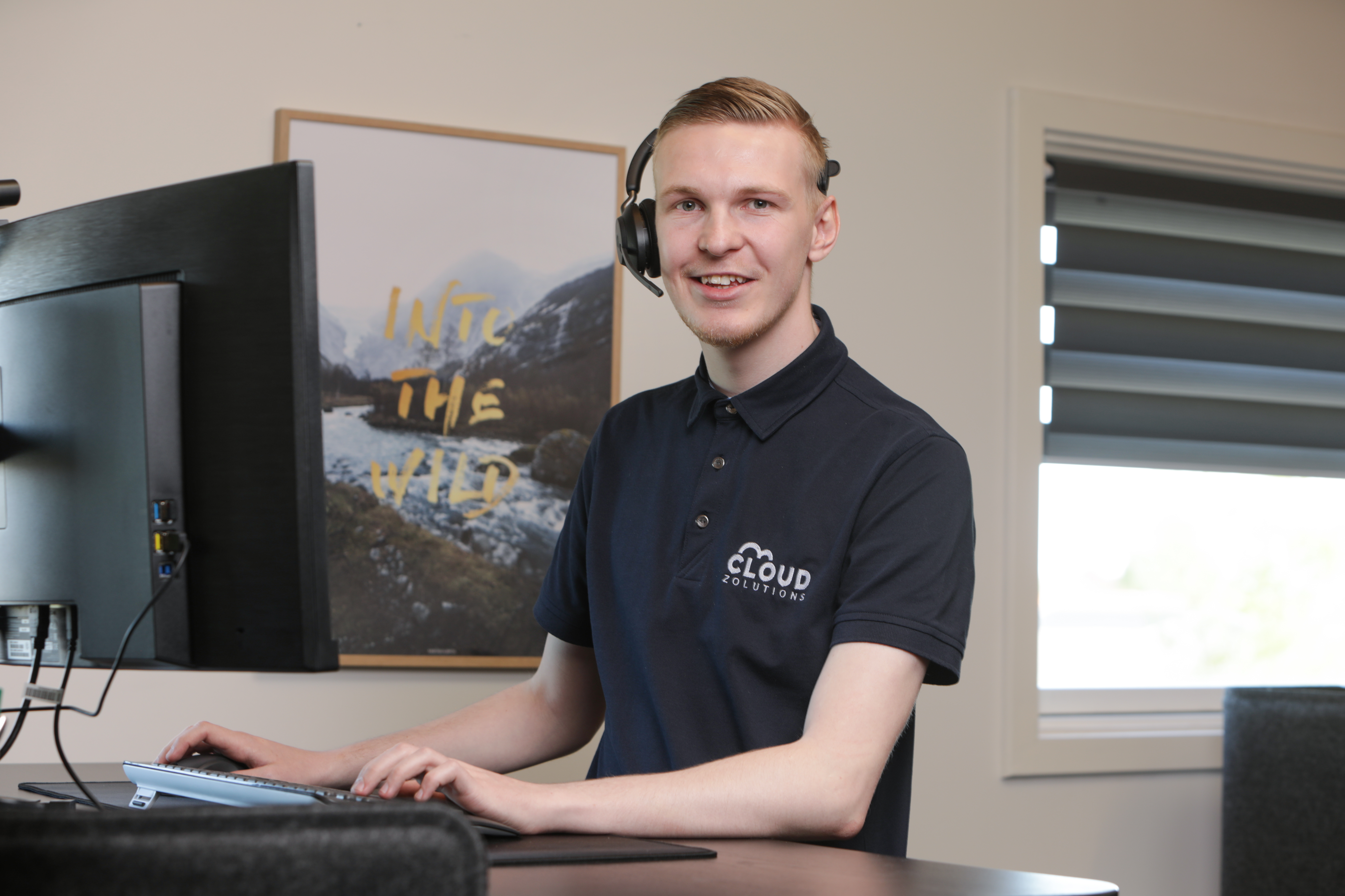 Support-specialist med headset